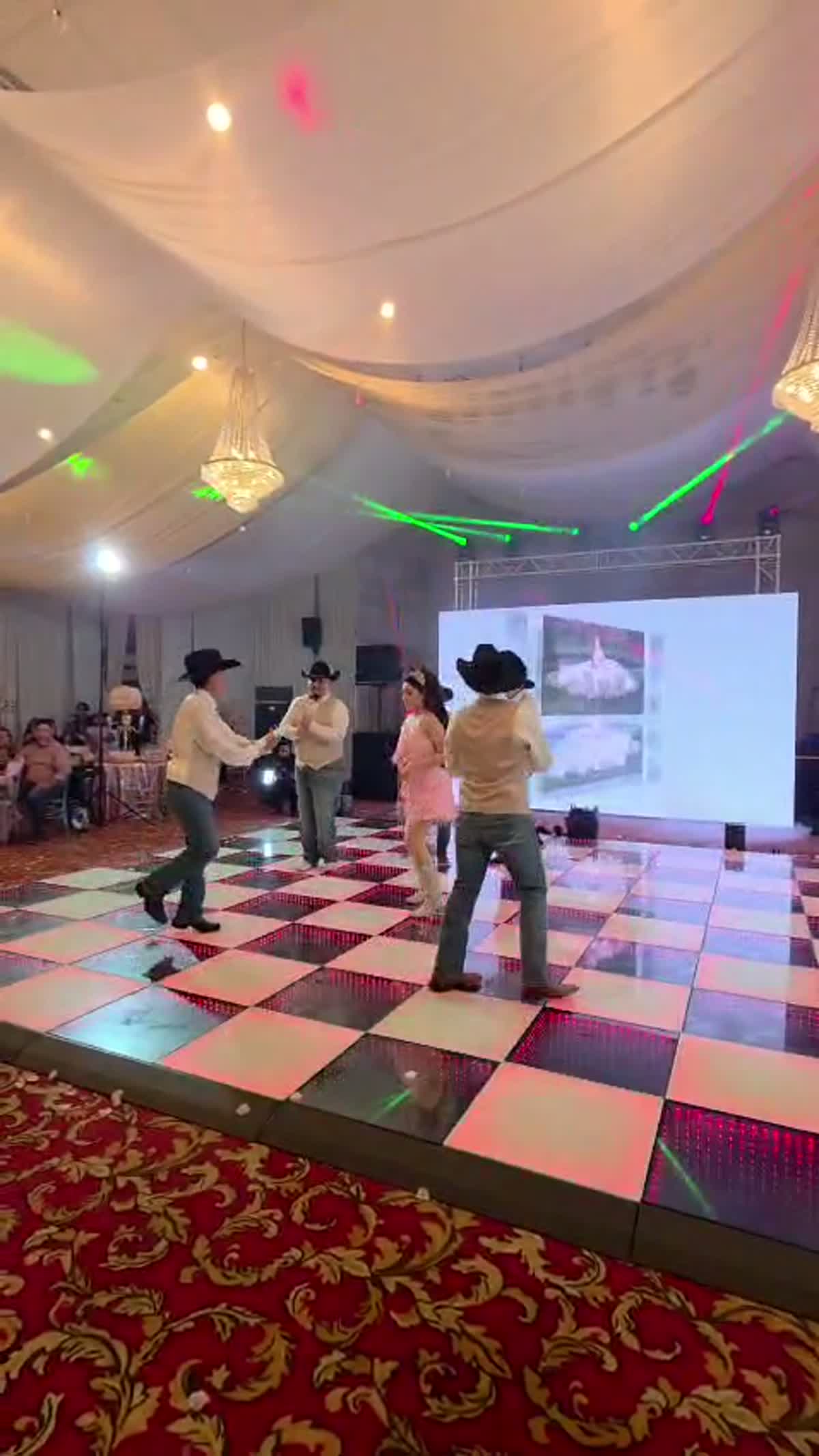 Reception dancers on the reactive LED dance floor