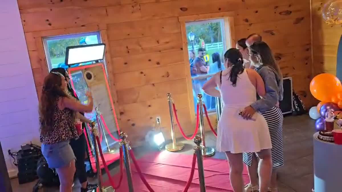 360° photo booth in action at a private event
